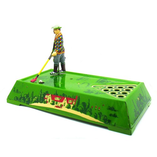 Blechspielzeug mit golfspieler - blechspielzeug,